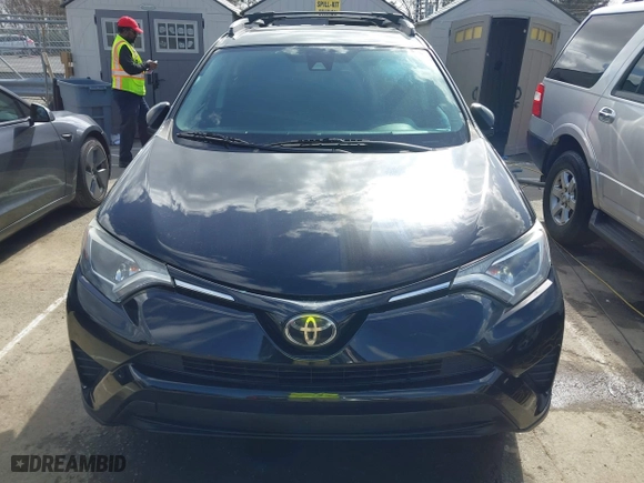 2018 Toyota RAV4 LE with VIN 2T3ZFREV9JW457062, listed as a IAAI auction lot 41696609 with 96,716 mi miles. Bid and sale history available at carsss.com. Image 12.