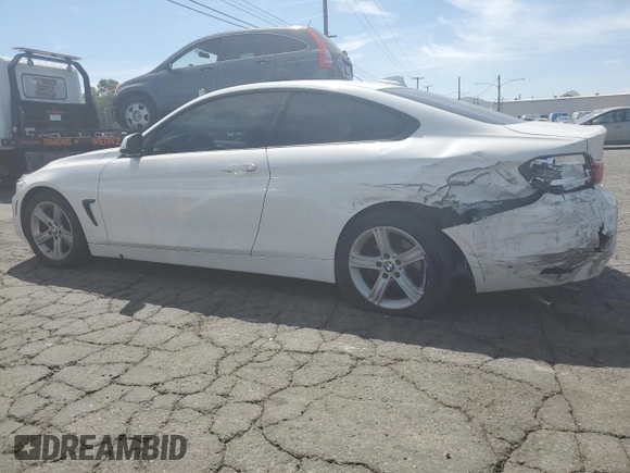 2014 BMW 4 Series 428i with VIN WBA3N7C59EF718310, listed as a Copart auction lot 53850285 with 198,306 mi miles and Salvage title. Bid and sale history available at DreamBid. Image 2.