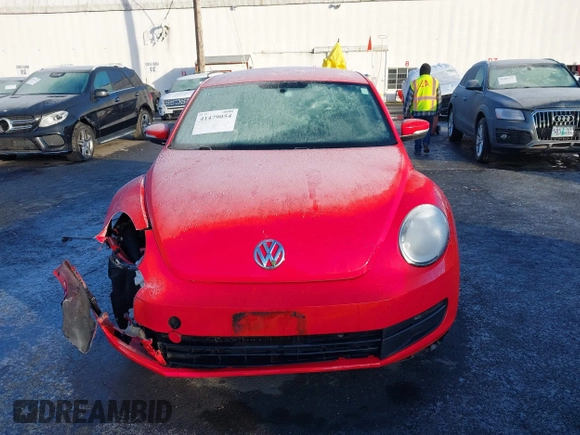 2014 Volkswagen Beetle 2.5L w/Sun with VIN 3VWJP7AT8EM629573, listed as a IAAI auction lot 41479054 with 73,950 mi miles and . Bid and sale history available at DreamBid. Image 12.