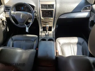 2013 Lincoln MKX z VIN 2LMDJ8JK1DBL36192, wystawiony jako Copart lot #56359355 z przebiegiem 132 913 mil mil oraz Szkoda całkowita • Salvage title. Historia ofert i sprzedaży dostępna na DreamBid. Obrazek 8.