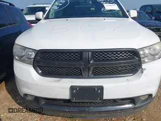 2013 Dodge Durango Crew with VIN 1C4RDJDG8DC664544, listed as a IAAI auction lot 42608957 with 202,564 mi miles and . Bid and sale history available at DreamBid. Image 6.