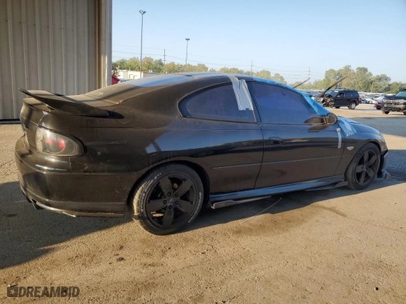 2004 Pontiac GTO with VIN 6G2VX12G04L200129, listed as a Copart auction lot 71822564 with 124,155 mi miles and Salvage Title. Bid and sale history available at carsss.com. Image 3.