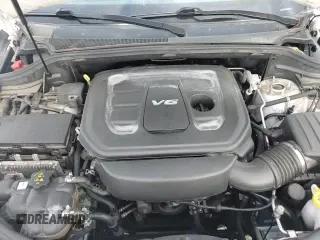 2018 Jeep Grand Cherokee Laredo z VIN 1C4RJFAG9JC303121, wystawiony jako Copart lot #90259455 z przebiegiem 125 299 mil mil oraz Czysty tytuł • Clean title. Historia ofert i sprzedaży dostępna na DreamBid. Obrazek 14.