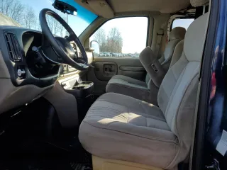 1999 Chevrolet Express with VIN 1GBFG15R5X1100445, listed as a Copart auction lot 82358104 with 154,515 mi miles and Clean Title. Bid and sale history available at carsss.com. Image 7.