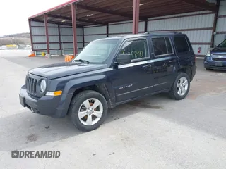 2014 Jeep Patriot Sport with VIN 1C4NJRBB8ED820851, listed as a IAAI auction lot 41858713 with 155,340 mi miles and . Bid and sale history available at carsss.com. Image 2.