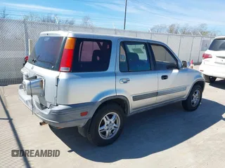 1999 Honda CR-V EX with VIN JHLRD1867XC060816, listed as a IAAI auction lot 41823958 with 220,322 mi miles. Bid and sale history available at carsss.com. Image 4.