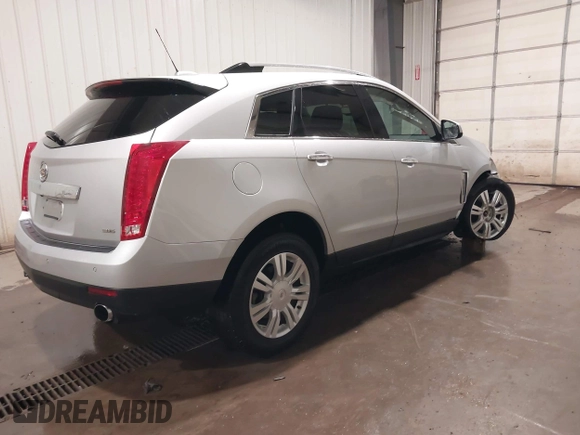 2016 Cadillac SRX Luxury Collection with VIN 3GYFNEE3XGS566210, listed as a IAAI auction lot 42094984 with 99,671 mi miles and . Bid and sale history available at DreamBid. Image 4.