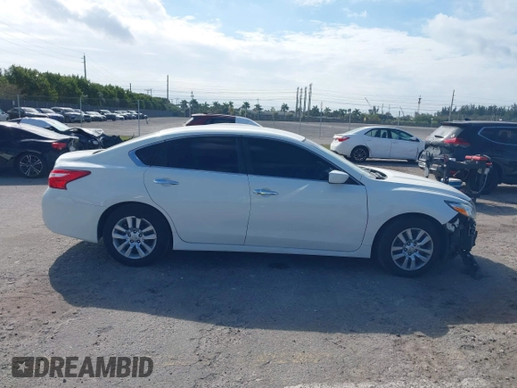 2016 Nissan Altima SV with VIN 1N4AL3AP4GC218983, listed as a IAAI auction lot 41346784 with 167,246 mi miles and . Bid and sale history available at DreamBid. Image 14.