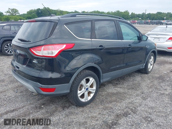 2014 Ford Escape SE with VIN 1FMCU9GX2EUB68419, listed as a IAAI auction lot 42741491 with Not provided miles and . Bid and sale history available at DreamBid. Image 4.