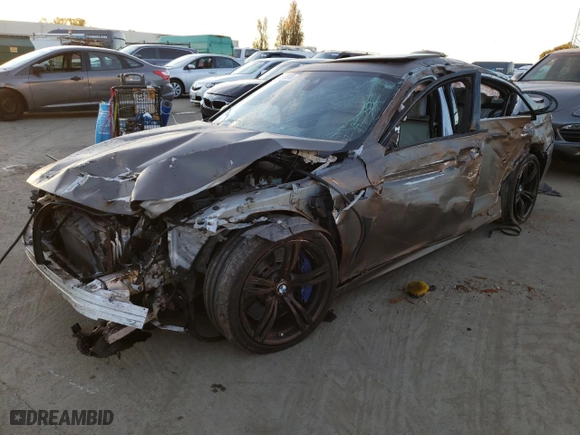 2015 BMW M5 with VIN WBSFV9C5XFD595067, listed as a Copart auction lot 80183913 with 0 mi miles. Bid and sale history available at carsss.com. Image 1.