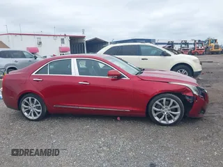 2014 Cadillac ATS Premium z VIN 1G6AE5S33E0125546, wystawiony jako IAAI lot #41989269 z przebiegiem 55 945 mil mil oraz . Historia ofert i sprzedaży dostępna na DreamBid. Obrazek 13.