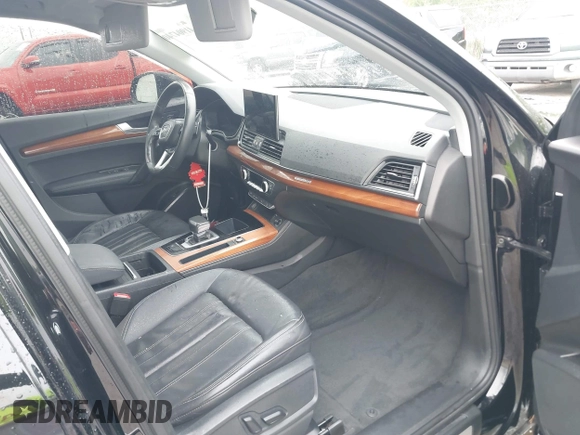2021 Audi Q5 Premium Plus with VIN WA1BAAFY3M2013760, listed as a IAAI auction lot 41904740 with 64,829 mi miles and . Bid and sale history available at DreamBid. Image 5.