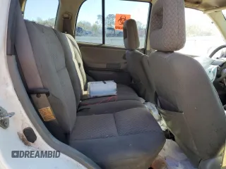 2003 Chevrolet Tracker z VIN 2CNBE13C736912038, wystawiony jako Copart lot #80422844 z przebiegiem 242 512 mil mil oraz Szkoda całkowita • Salvage title. Historia ofert i sprzedaży dostępna na DreamBid. Obrazek 10.