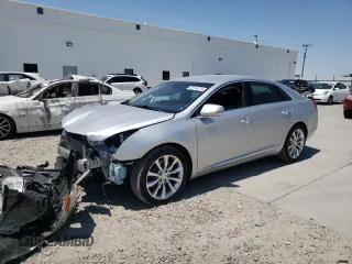 2016 Cadillac XTS Luxury Collection z VIN 2G61N5S35G9197325, wystawiony jako Copart lot #55613225 z przebiegiem 131 404 mil mil oraz Szkoda całkowita • Salvage title. Historia ofert i sprzedaży dostępna na DreamBid. Obrazek 1.