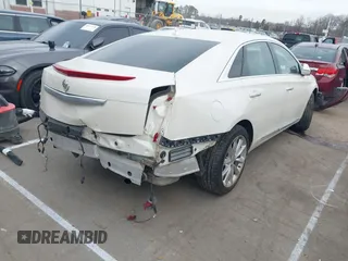2014 Cadillac XTS Luxury with VIN 2G61M5S3XE9185493, listed as a IAAI auction lot 41711302 with 89,725 mi miles. Bid and sale history available at carsss.com. Image 4.