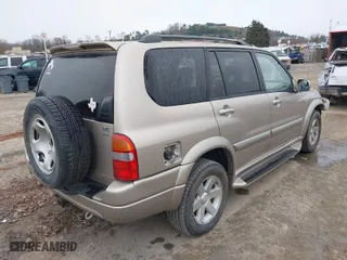 2003 Suzuki XL-7 Touring with VIN JS3TX92V334115616, listed as a IAAI auction lot 40899791 with 154,521 mi miles. Bid and sale history available at carsss.com. Image 4.