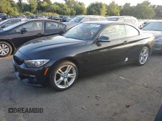 2019 BMW 4 Series 430i xDrive with VIN WBA4Z3C58KEF31811, listed as a Copart auction lot 50414074 with 55,807 mi miles and Salvage title. Bid and sale history available at DreamBid. Image 1.