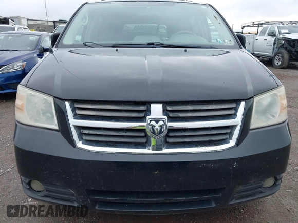 2009 Dodge Grand Caravan SXT z VIN 2D8HN54109R596185, wystawiony jako IAAI lot #42382133 z przebiegiem 207 882 mil mil oraz . Historia ofert i sprzedaży dostępna na DreamBid. Obrazek 6.