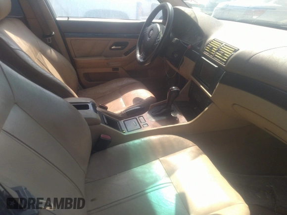 2000 BMW 5 Series 528i z VIN WBADM6347YGU09362, wystawiony jako IAAI lot #31257286 z przebiegiem Nie podano mil oraz . Historia ofert i sprzedaży dostępna na DreamBid. Obrazek 5.