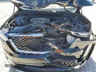 2024 Cadillac XT6 Premium Luxury z VIN 1GYKPERS1RZ755490, wystawiony jako Copart lot #49706575 z przebiegiem 4 239 mil mil oraz Szkoda całkowita • Salvage title. Historia ofert i sprzedaży dostępna na DreamBid. Obrazek 12.