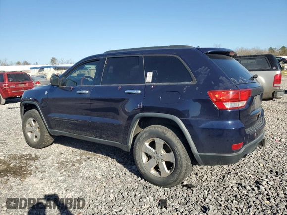 2013 Jeep Grand Cherokee Overland with VIN 1C4RJFCT8DC523252, listed as a Copart auction lot 48706965 with 173,325 mi miles and Salvage Title. Bid and sale history available at carsss.com. Image 2.