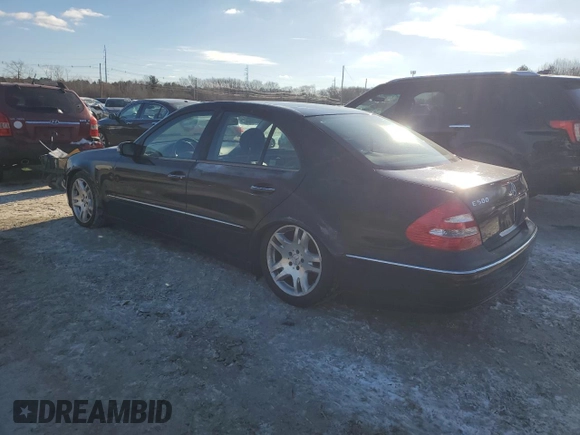 2003 Mercedes-Benz E-Class 5.0L with VIN WDBUF70J43A123959, listed as a Copart auction lot 45032875 with 136,922 mi miles and Non Repairable. Bid and sale history available at carsss.com. Image 2.