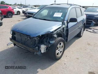 2010 Toyota RAV4 with VIN JTMZF4DV2AD027732, listed as a IAAI auction lot 42299192 with 188,758 mi miles and . Bid and sale history available at DreamBid. Image 2.