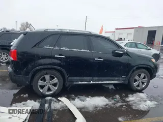 2012 Kia Sorento EX with VIN 5XYKUDA2XCG301636, listed as a IAAI auction lot 41619793 with 220,692 mi miles. Bid and sale history available at carsss.com. Image 13.