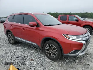 2018 Mitsubishi Outlander SE with VIN JA4AD3A33JZ013478, listed as a Copart auction lot 57941215 with 130,824 mi miles and Salvage title. Bid and sale history available at DreamBid. Image 4.
