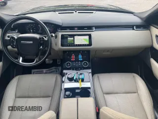 2018 Land Rover Range Rover Velar R-Dynamic SE z VIN SALYL2RX7JA715416, wystawiony jako Copart lot #62775895 z przebiegiem 123 921 mil mil oraz Czysty tytuł • Clean title. Historia ofert i sprzedaży dostępna na DreamBid. Obrazek 9.