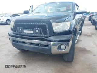2013 Toyota Tundra Limited with VIN 5TFFY5F19DX142652, listed as a IAAI auction lot 42165369 with 152,286 mi miles and . Bid and sale history available at DreamBid. Image 6.