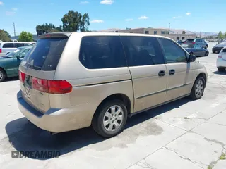 2001 Honda Odyssey LX z VIN 2HKRL18501H610649, wystawiony jako IAAI lot #42799158 z przebiegiem 197 944 mil mil oraz . Historia ofert i sprzedaży dostępna na DreamBid. Obrazek 4.