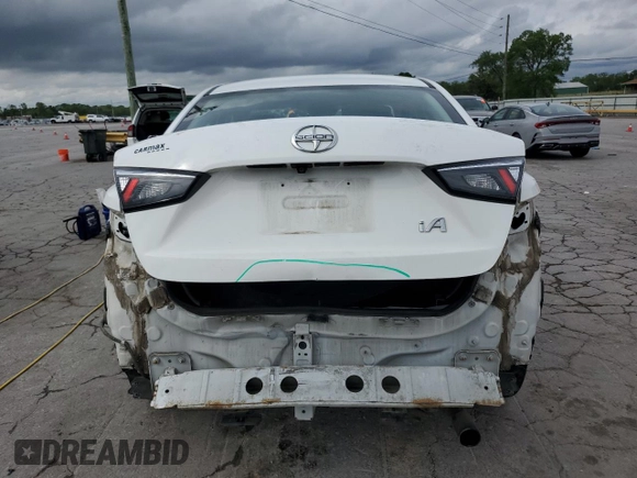 2016 Scion iA with VIN 3MYDLBZV0GY114102, listed as a Copart auction lot 54021995 with 123,764 mi miles and Salvage Title. Bid and sale history available at DreamBid. Image 6.