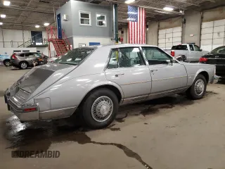 1980 Cadillac Seville z VIN 6S69NAE688845, wystawiony jako Copart lot #78749194 z przebiegiem 66 974 mil mil oraz Tytuł czysty. Historia ofert i sprzedaży dostępna na DreamBid. Obrazek 3.