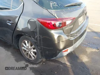 2015 Mazda 3 i Touring with VIN 3MZBM1L74FM236410, listed as a IAAI auction lot 41339253 with 119,731 mi miles and . Bid and sale history available at DreamBid. Image 16.