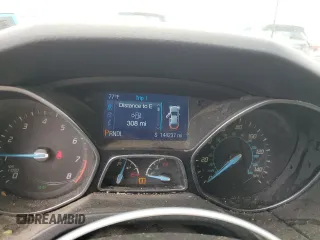 2014 Ford Focus SE z VIN 1FADP3K23EL379262, wystawiony jako Copart lot #54202305 z przebiegiem 144 237 mil mil oraz Szkoda całkowita • Salvage title. Historia ofert i sprzedaży dostępna na DreamBid. Obrazek 9.