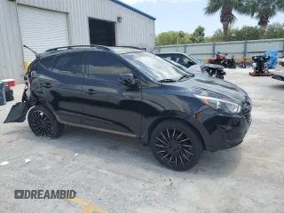 2010 Hyundai Tucson GLS with VIN KM8JU3AC2AU079129, listed as a Copart auction lot 54312875 with 116,659 mi miles and Salvage Title. Bid and sale history available at DreamBid. Image 4.