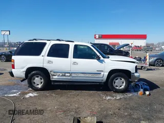2003 GMC Yukon SLT with VIN 1GKEC13Z13J197955, listed as a IAAI auction lot 41586841 with 208,752 mi miles. Bid and sale history available at carsss.com. Image 13.