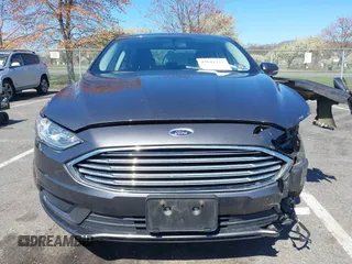 2017 Ford Fusion SE with VIN 3FA6P0H70HR107252, listed as a IAAI auction lot 42041332 with 121,255 mi miles. Bid and sale history available at carsss.com. Image 12.