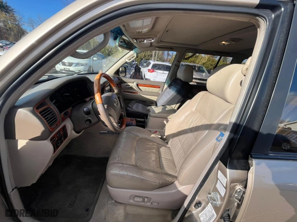 2001 Lexus LX 470 with VIN JTJHT00W013503765, listed as a Copart auction lot 80843654 with 219,615 mi miles and Clean Title. Bid and sale history available at carsss.com. Image 7.