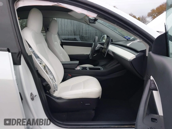 2022 Tesla Model Y Long Range with VIN 7SAYGDEE3NF380067, listed as a IAAI auction lot 41016704 with 52,180 mi miles and . Bid and sale history available at DreamBid. Image 5.