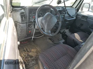 1999 Jeep Wrangler Sport with VIN 1J4FY19SXXP464096, listed as a Copart auction lot 61233105 with 167,350 mi miles and Clean title. Bid and sale history available at DreamBid. Image 8.