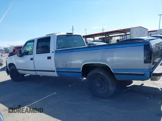 1996 GMC Sierra 1500 with VIN 1GTGC33R4TF018147, listed as a IAAI auction lot 41612770 with 106,443 mi miles and . Bid and sale history available at DreamBid. Image 14.