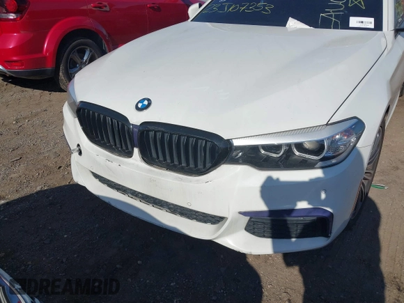 2018 BMW 5 Series 530i xDrive with VIN WBAJA7C58JG907988, listed as a IAAI auction lot 38011708 with Not provided miles and . Bid and sale history available at DreamBid. Image 6.