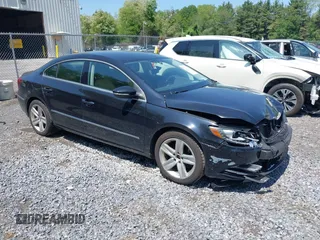 2015 Volkswagen CC Sport with VIN WVWBP7AN2FE828585, listed as a IAAI auction lot 42410791 with 143,056 mi miles and . Bid and sale history available at DreamBid. Image 1.