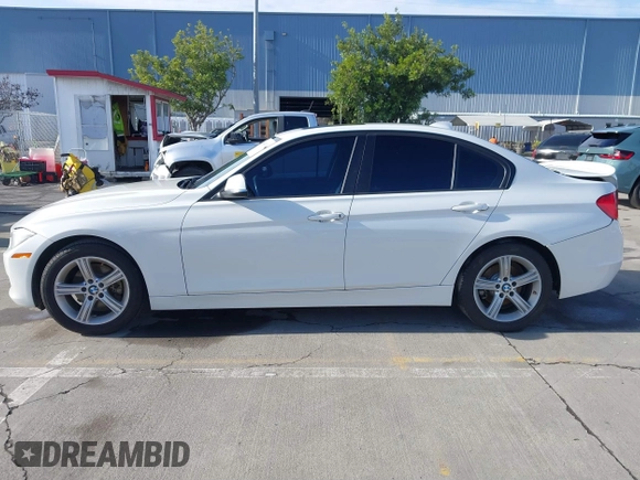 2015 BMW 3 Series 328i with VIN WBA3C1C52FK119339, listed as a IAAI auction lot 41549876 with 148,347 mi miles and . Bid and sale history available at carsss.com. Image 14.