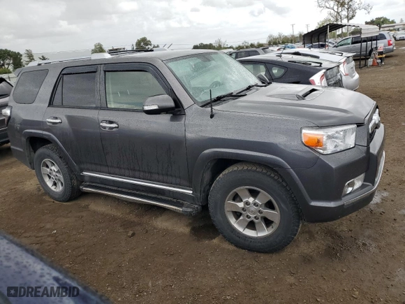 2013 Toyota 4Runner SR5 with VIN JTEZU5JRXD5053685, listed as a Copart auction lot 50911565 with 130,851 mi miles and Salvage Title. Bid and sale history available at carsss.com. Image 4.