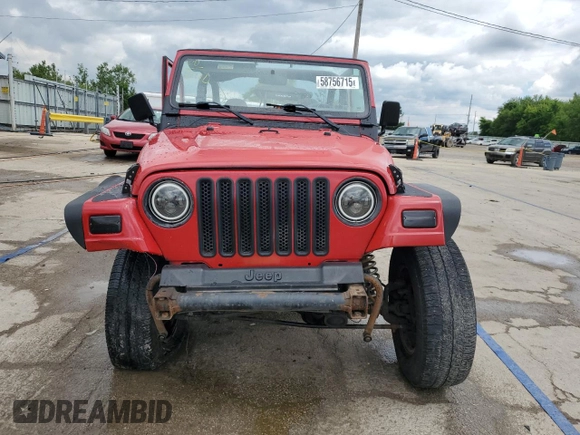 2000 Jeep Wrangler SE with VIN 1J4FA29P6YP793045, listed as a Copart auction lot 58756715 with 202,110 mi miles and Salvage title. Bid and sale history available at DreamBid. Image 5.