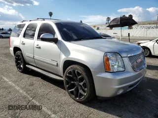 2014 GMC Yukon SLT with VIN 1GKS1CE05ER197674, listed as a Copart auction lot 45934674 with 130,623 mi miles and Salvage Title. Bid and sale history available at carsss.com. Image 4.