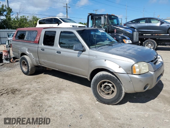 2004 Nissan Frontier XE with VIN 1N6ED29X24C436064, listed as a Copart auction lot 58916434 with 277,026 mi miles and Salvage title. Bid and sale history available at DreamBid. Image 4.